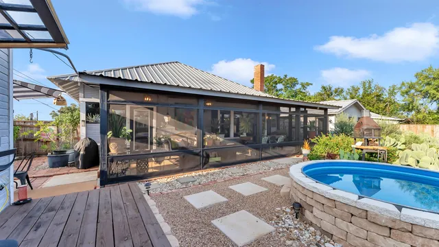 a view of a house with sitting area and furniture