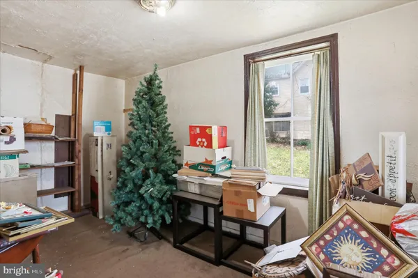 a room with furniture and a window