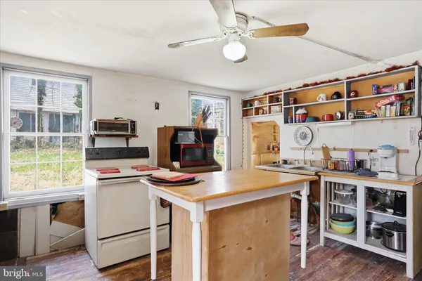 a view of workspace with wooden floor