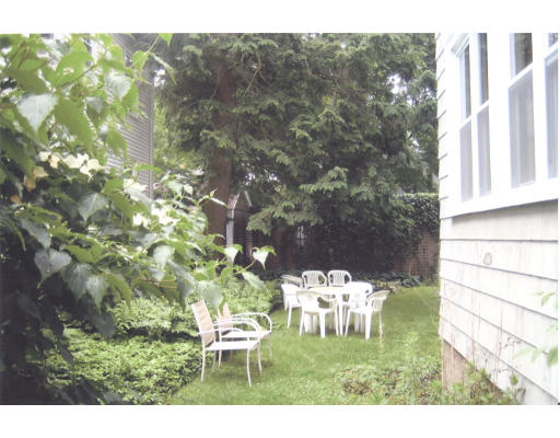 59 Withington Road Newton, MA 02460 - Photo 11 of 11 a backyard of a house with table and chairs