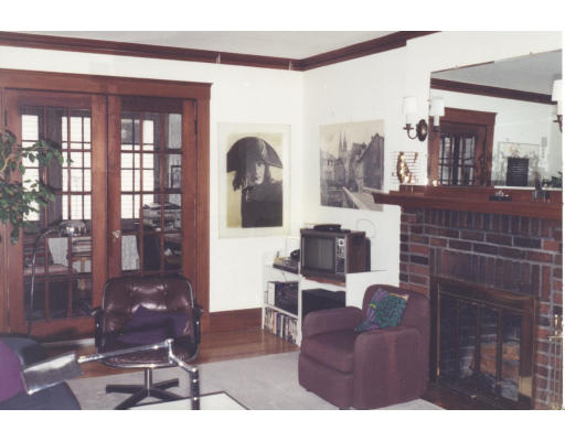 59 Withington Road Newton, MA 02460 - Photo 3 of 11 a living room with furniture a large window and wooden floor