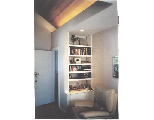 59 Withington Road Newton, MA 02460 - Photo 6 of 11 a view of a hallway with wooden cabinet