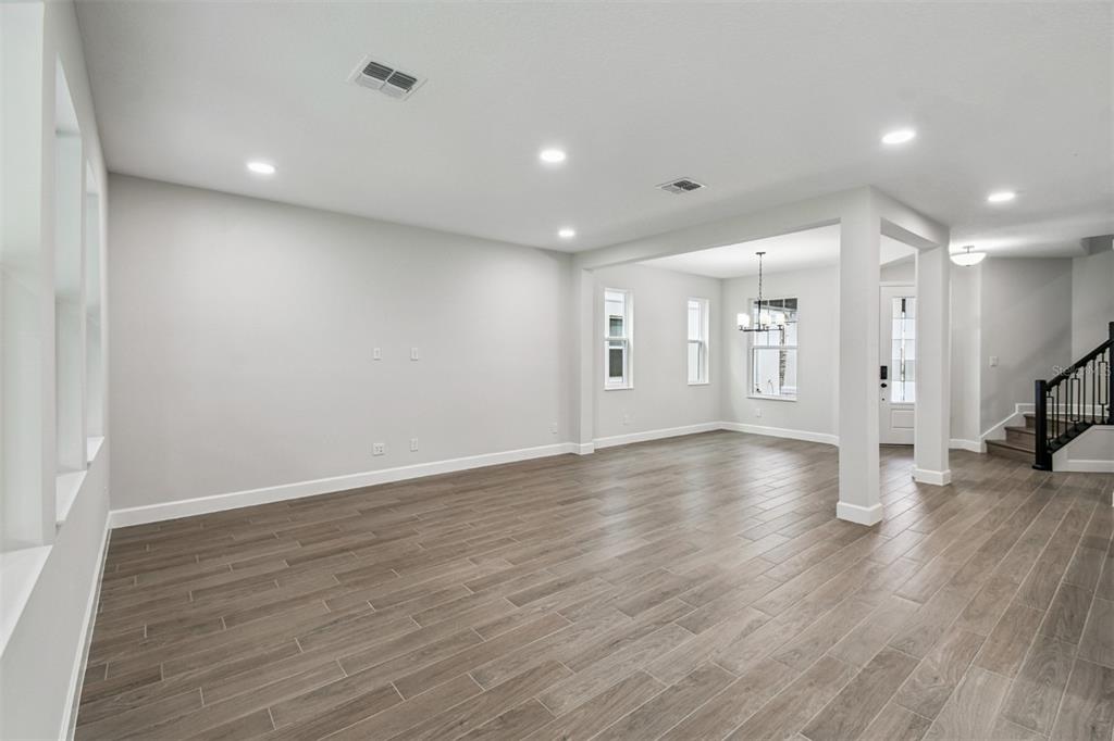 5262 Prairie Preserve Run St. Cloud, FL 34772 - Photo 32 of 40 a view of a livingroom with wooden floor