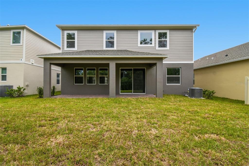 5262 Prairie Preserve Run St. Cloud, FL 34772 - Photo 34 of 40 a view of a house with yard and porch