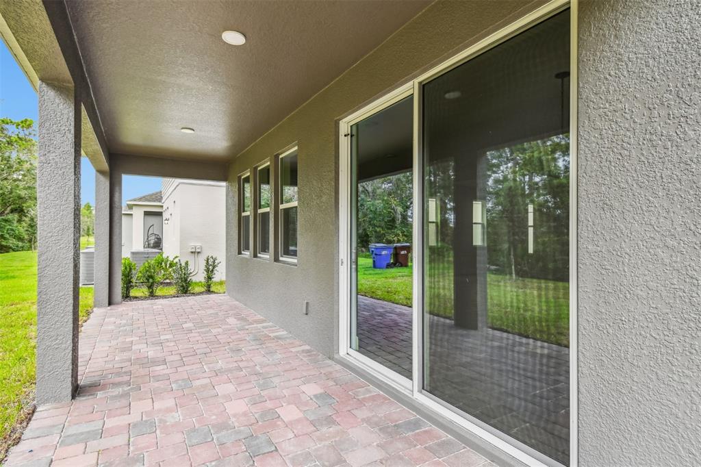 5262 Prairie Preserve Run St. Cloud, FL 34772 - Photo 36 of 40 a view of a house with a porch