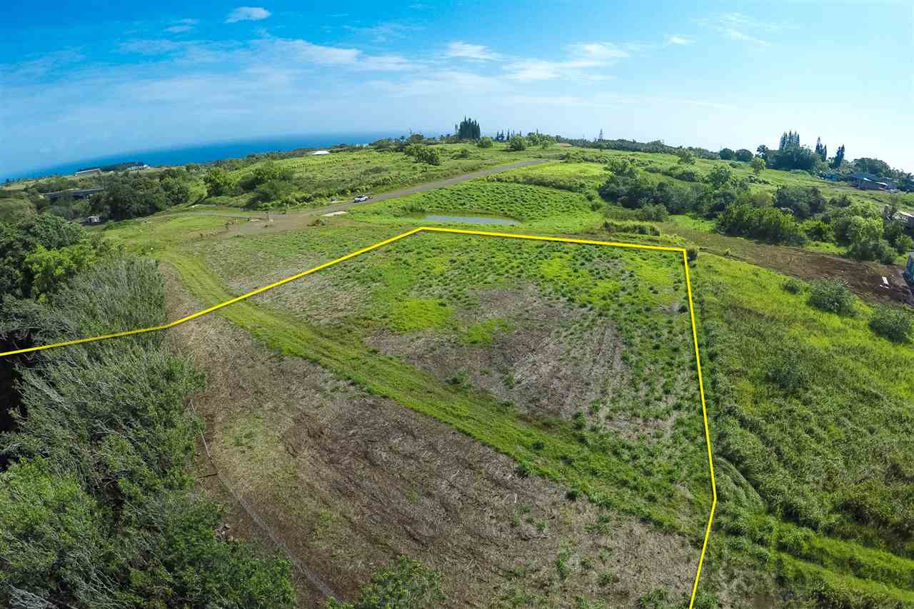 0 Hookili Road, Unit A Haiku, HI 96708 - Photo 1 of 7 a view of a field with an ocean