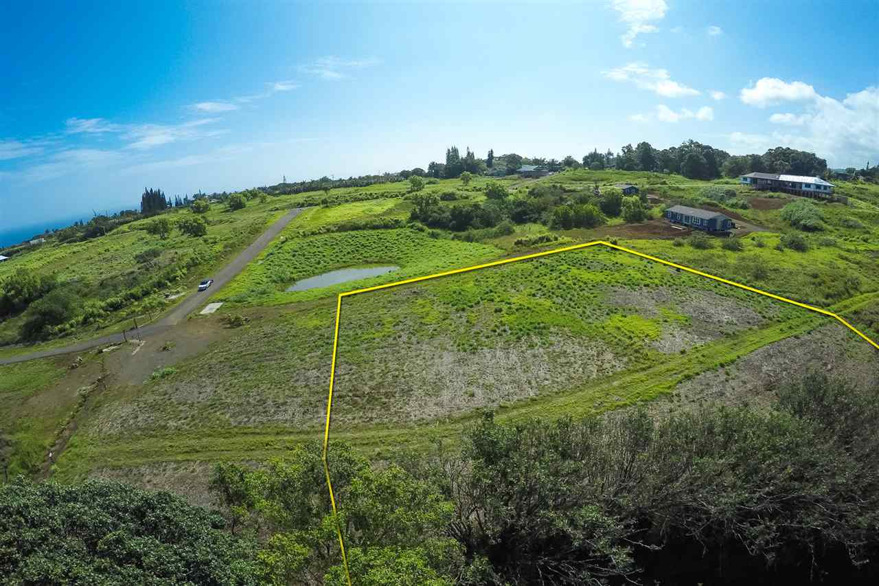 0 Hookili Road, Unit A Haiku, HI 96708 - Photo 2 of 7 a view of a field with an trees