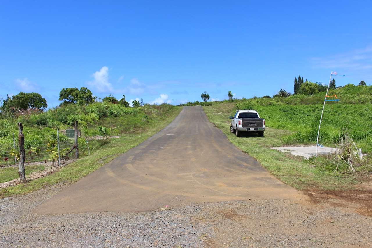0 Hookili Road, Unit A Haiku, HI 96708 - Photo 7 of 7 a view of a street with a houses in the background