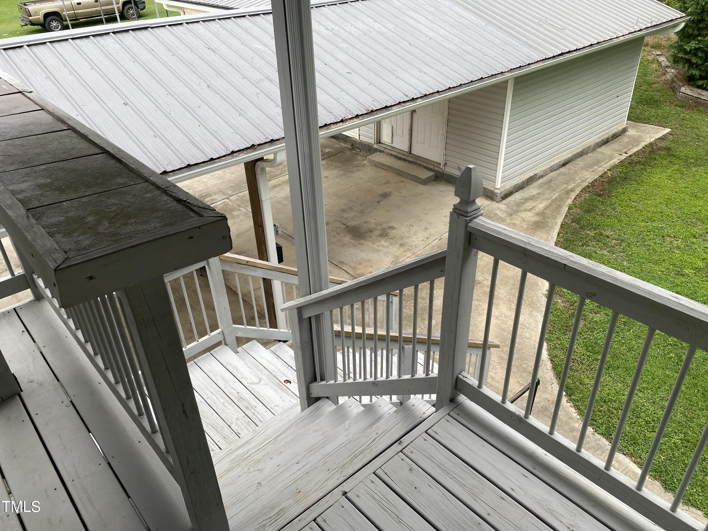 920 Vanco Mill Road Henderson, NC 27537 - Photo 18 of 26 a view of balcony with wooden floor