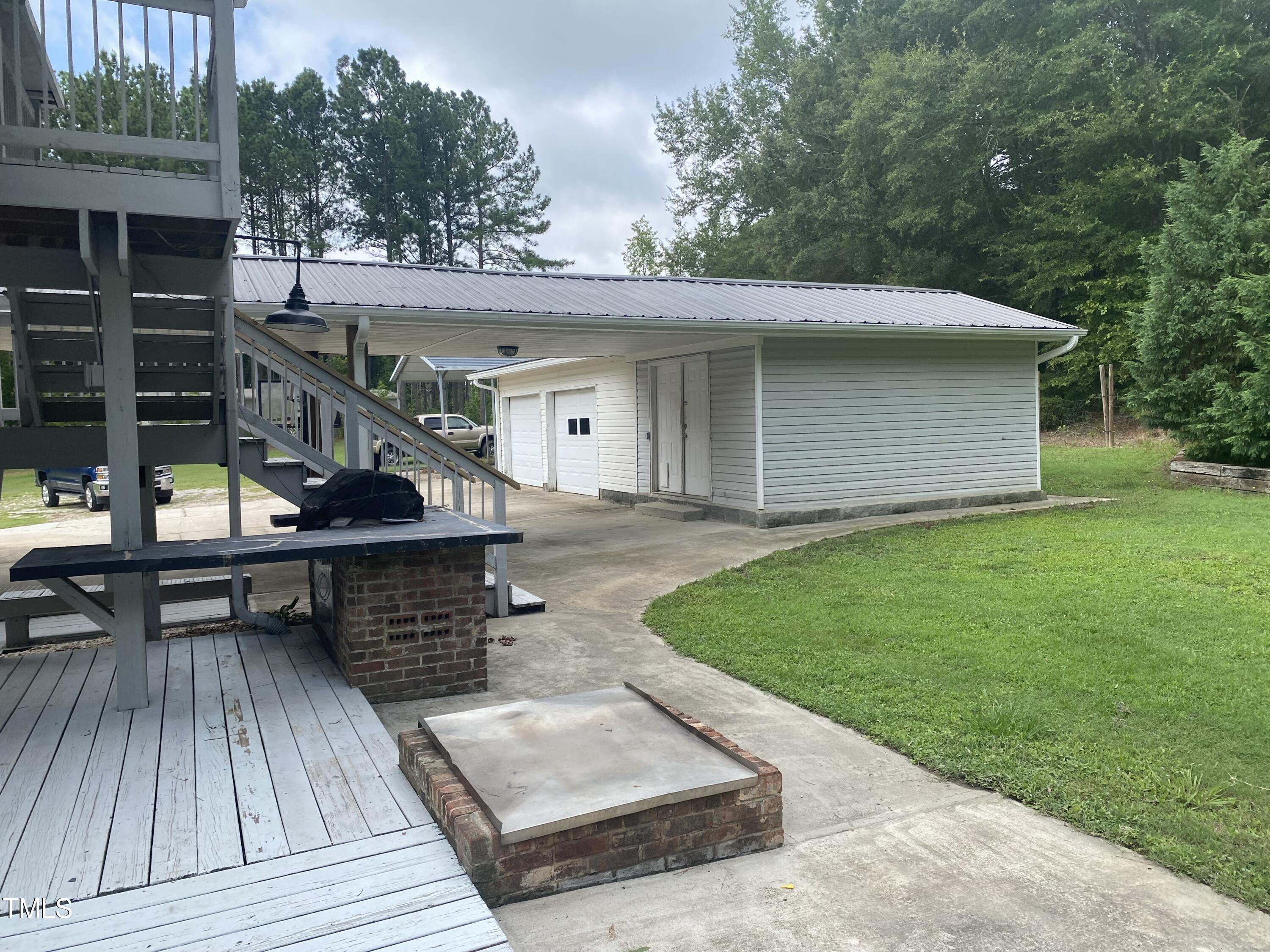 920 Vanco Mill Road Henderson, NC 27537 - Photo 22 of 26 a view of outdoor space yard deck and patio