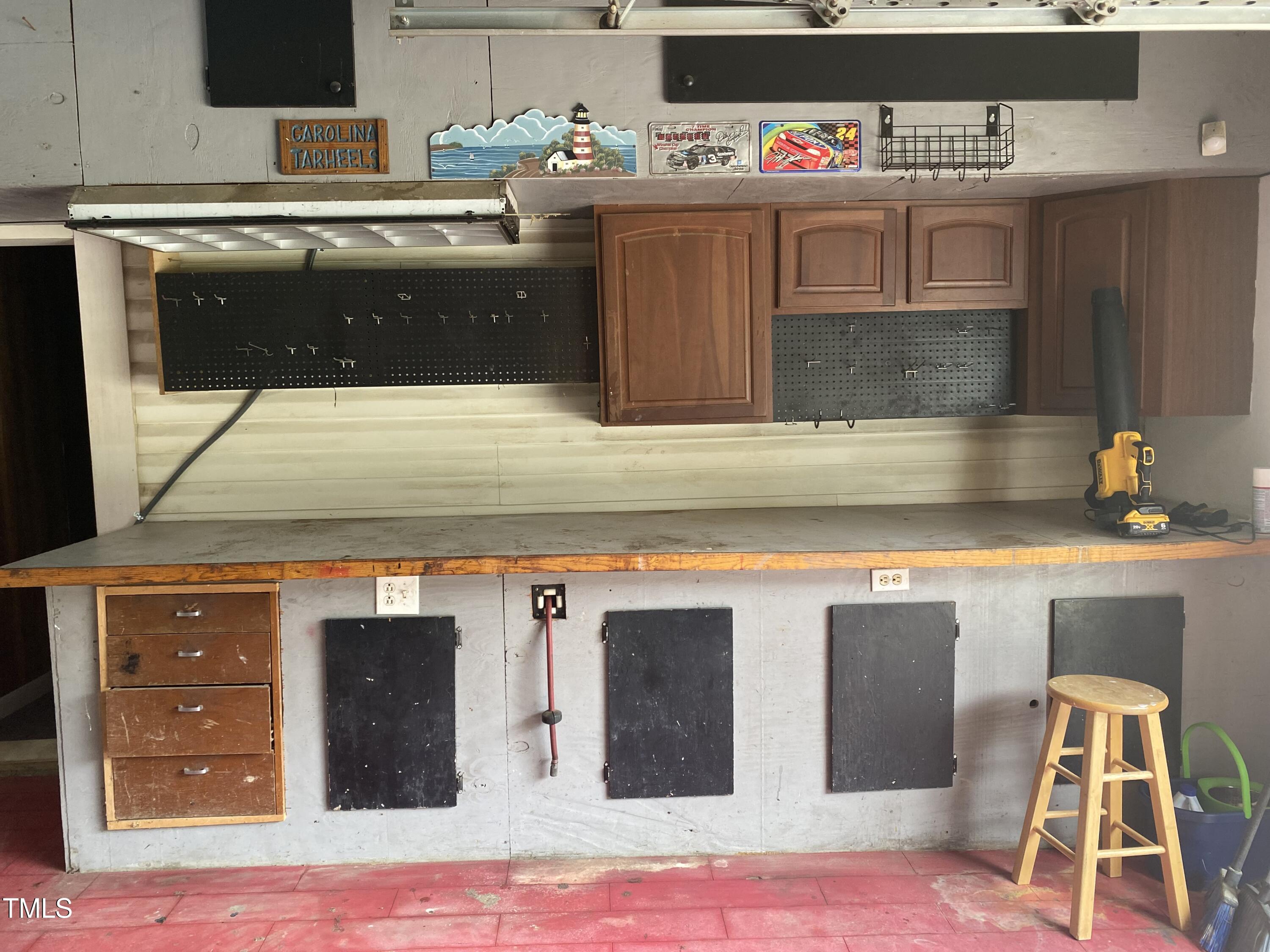 920 Vanco Mill Road Henderson, NC 27537 - Photo 7 of 26 a kitchen with a sink and a stove top oven