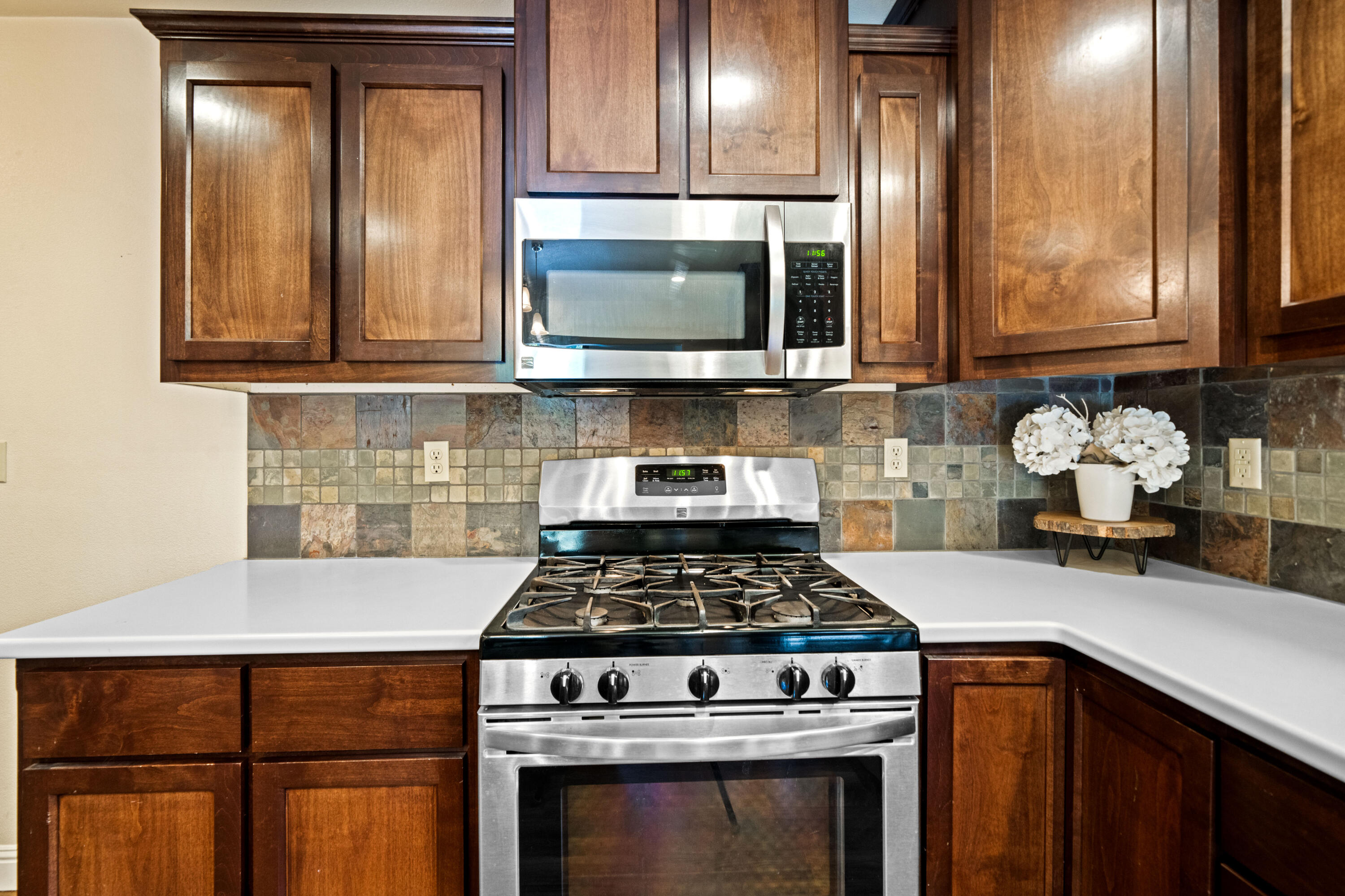 19610 Roaring Brook Way Lakehead, CA 96051 - Photo 21 of 58 a kitchen with granite countertop stainless steel appliances and wooden cabinets