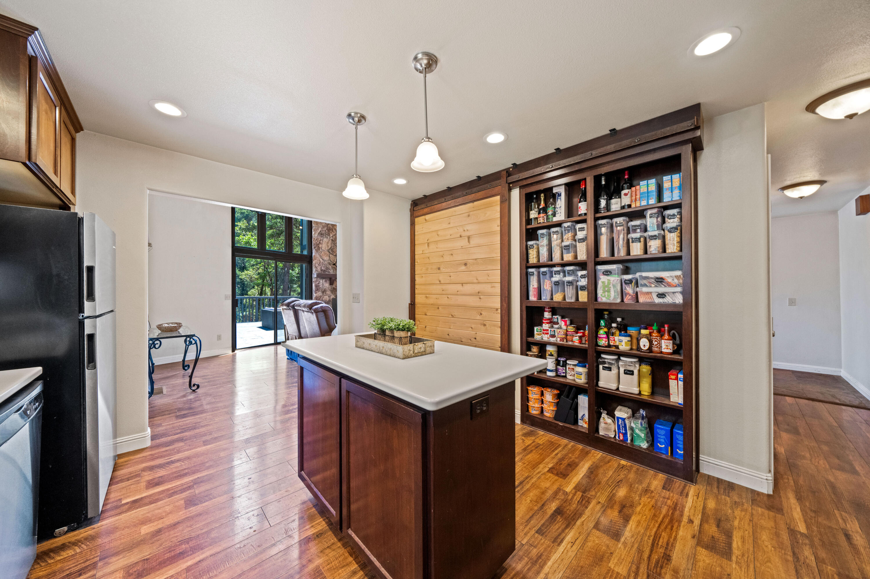 19610 Roaring Brook Way Lakehead, CA 96051 - Photo 22 of 58 a open kitchen with stainless steel appliances granite countertop a stove and refrigerator