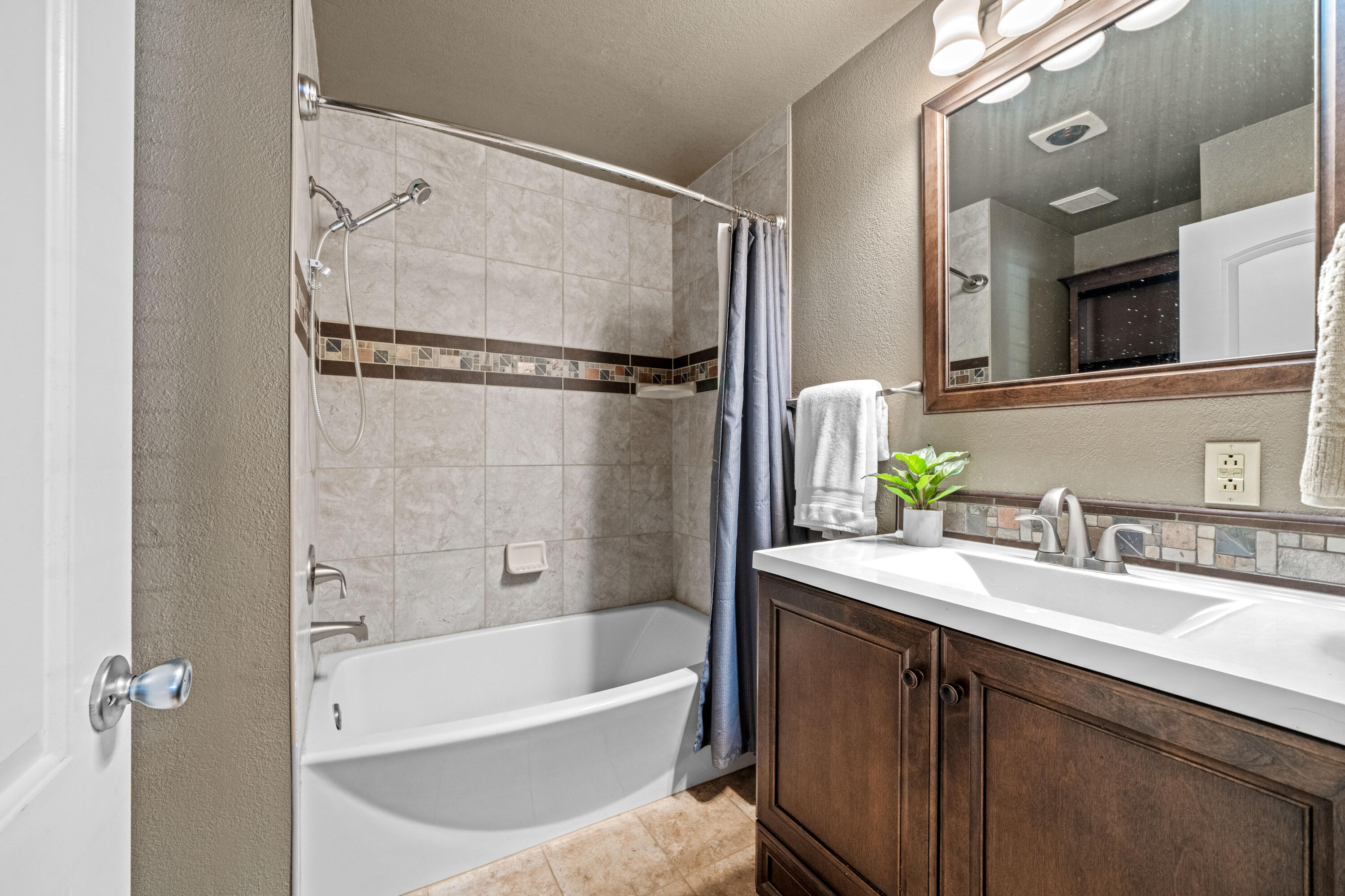 19610 Roaring Brook Way Lakehead, CA 96051 - Photo 27 of 58 a bathroom with a bath tub sink mirror and vanity