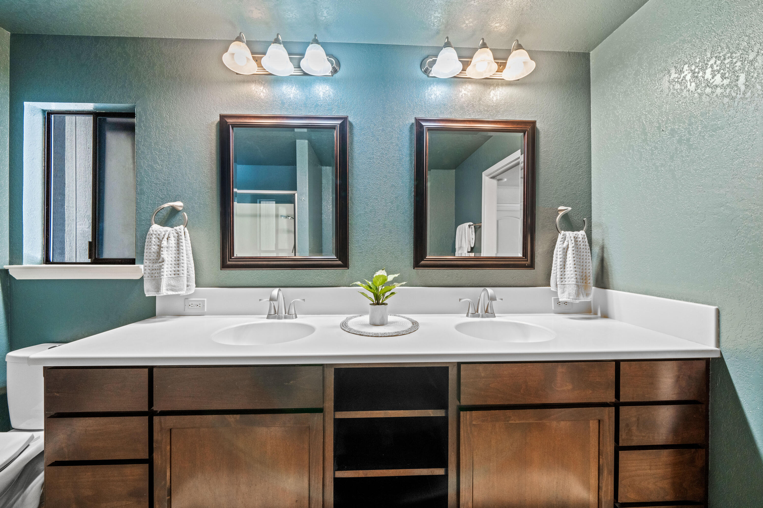 19610 Roaring Brook Way Lakehead, CA 96051 - Photo 36 of 58 a bathroom with a sink and a mirror