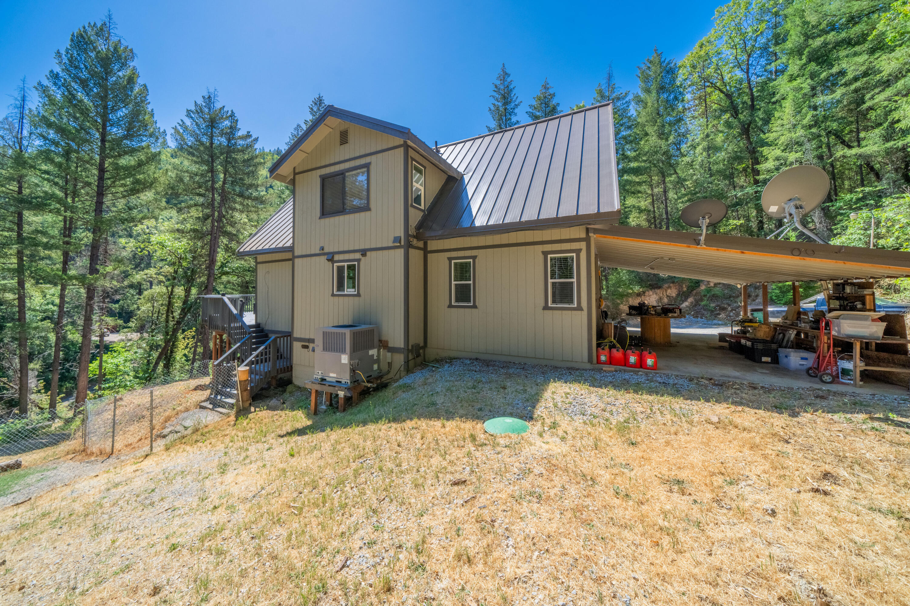 19610 Roaring Brook Way Lakehead, CA 96051 - Photo 44 of 58 a view of a house with a yard and sitting area