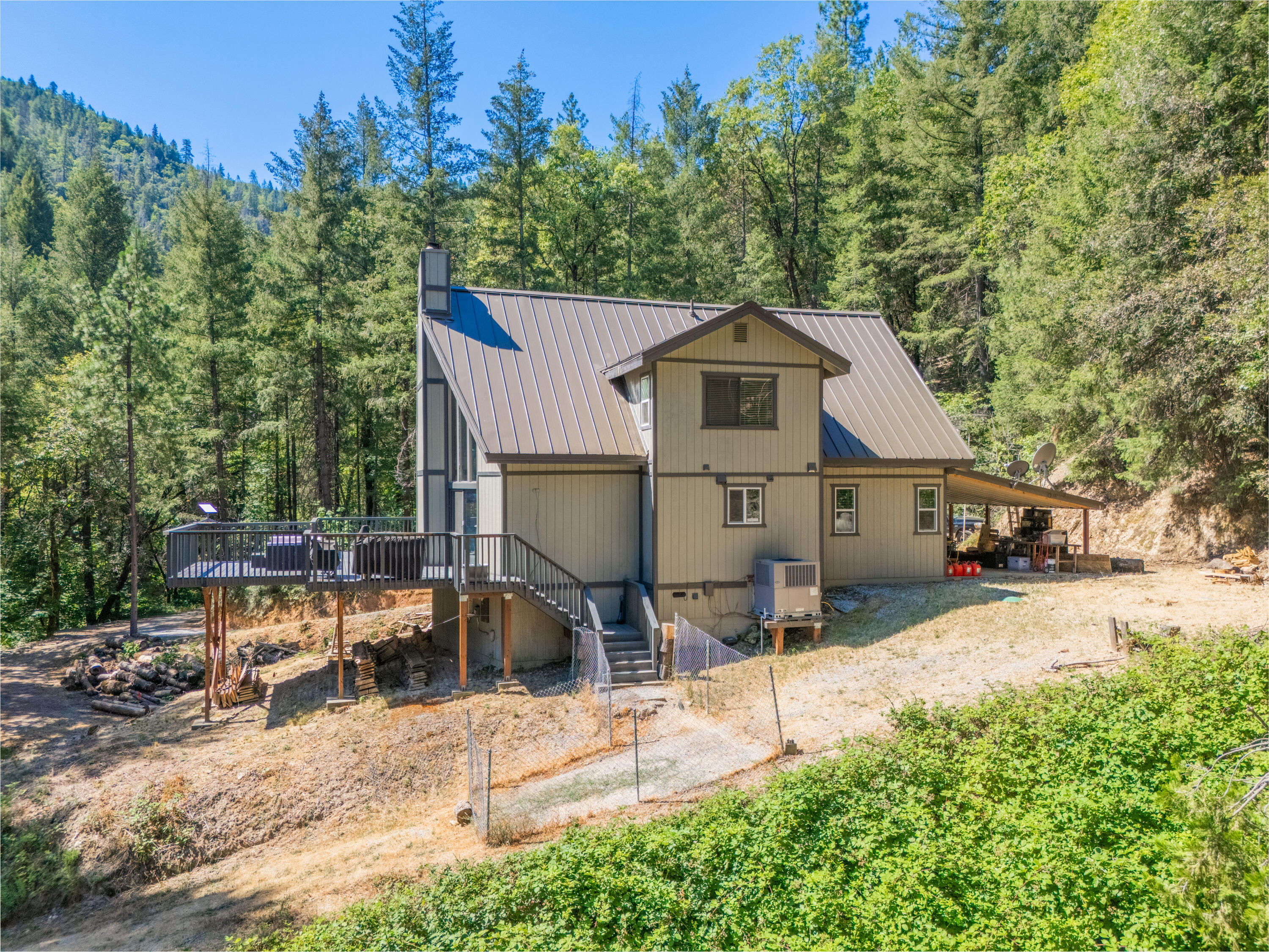 19610 Roaring Brook Way Lakehead, CA 96051 - Photo 46 of 58 a white house that has a tree in front of it