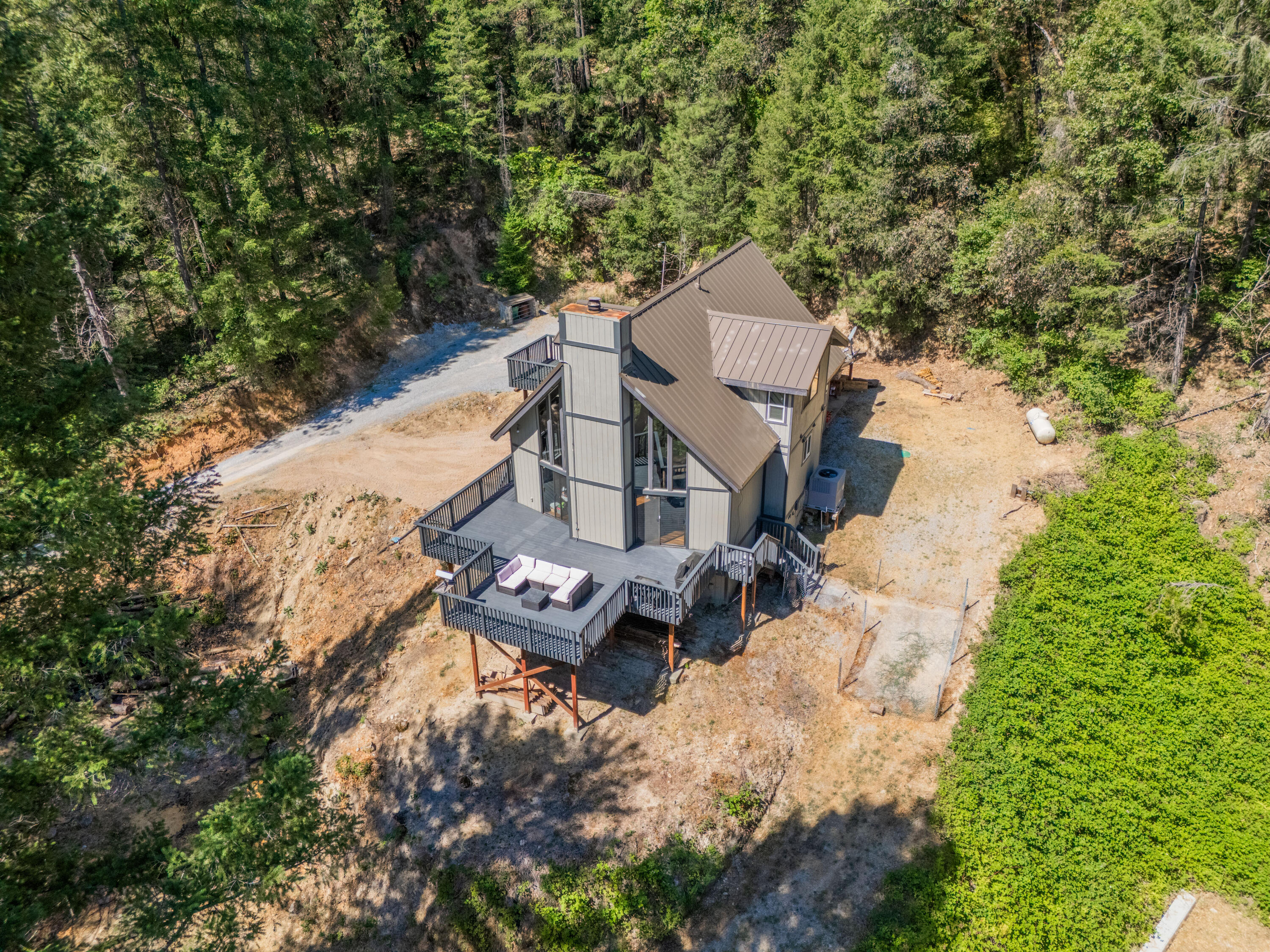 19610 Roaring Brook Way Lakehead, CA 96051 - Photo 47 of 58 a view of a house with a yard