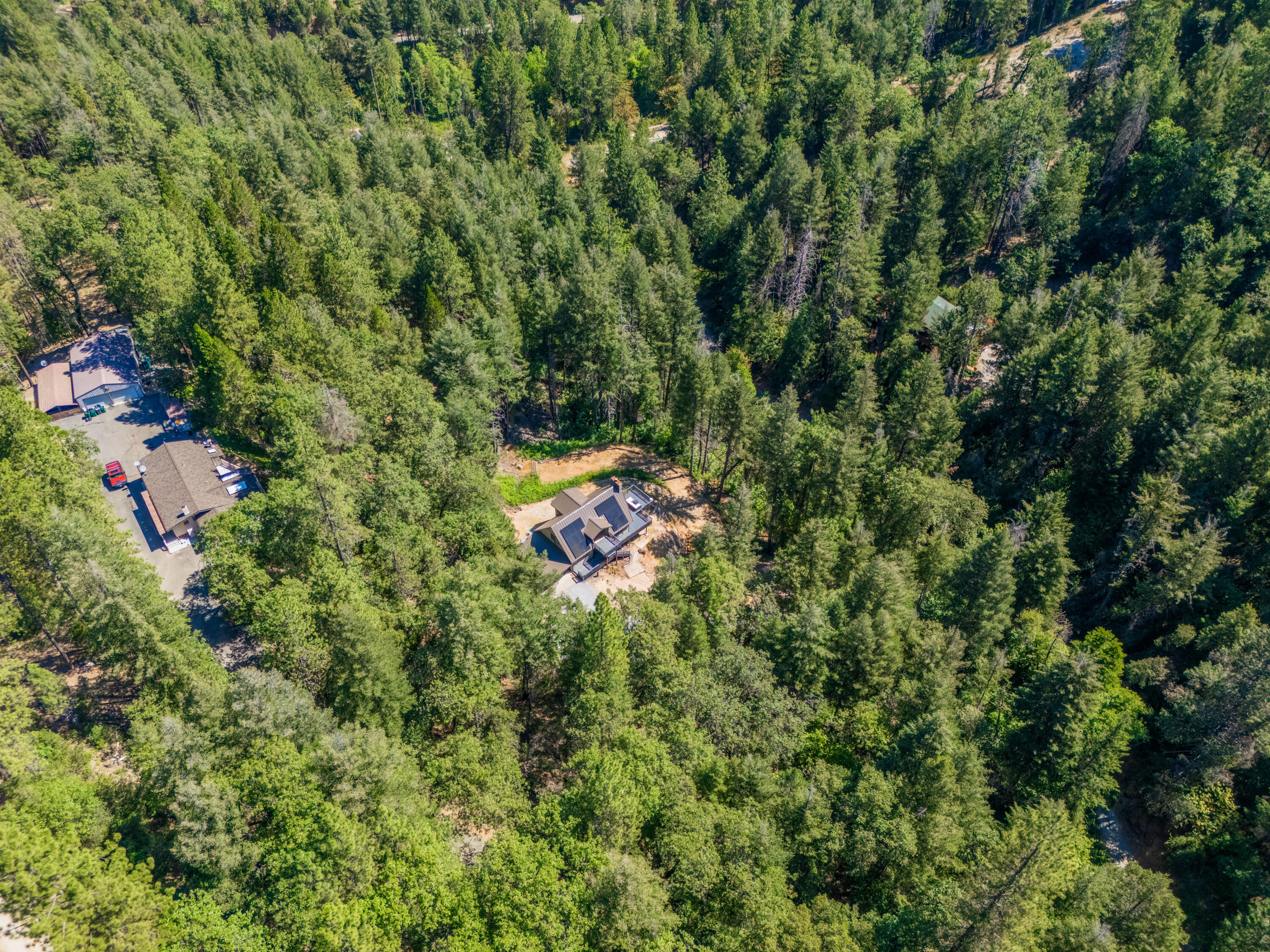 19610 Roaring Brook Way Lakehead, CA 96051 - Photo 53 of 58 an aerial view of residential house with outdoor space and trees all around