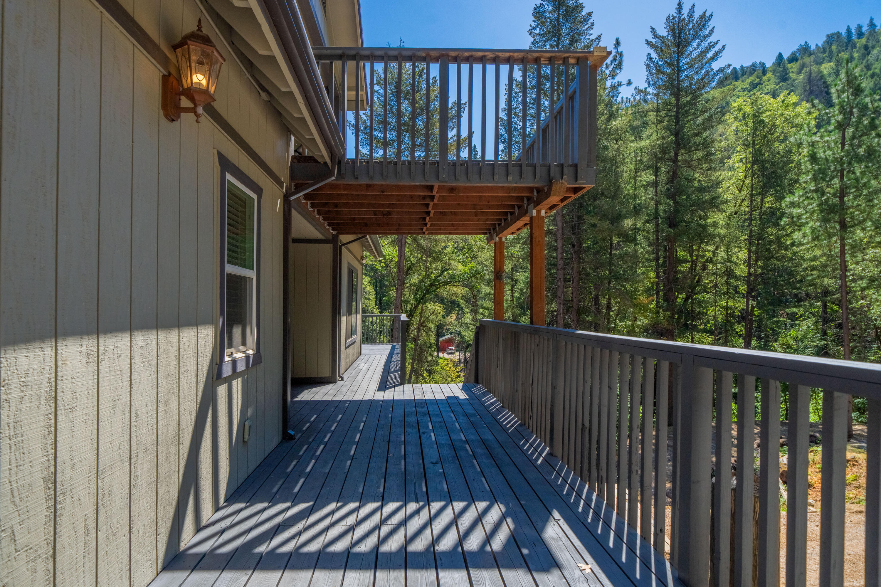 19610 Roaring Brook Way Lakehead, CA 96051 - Photo 9 of 58 a view of a balcony with wooden floor