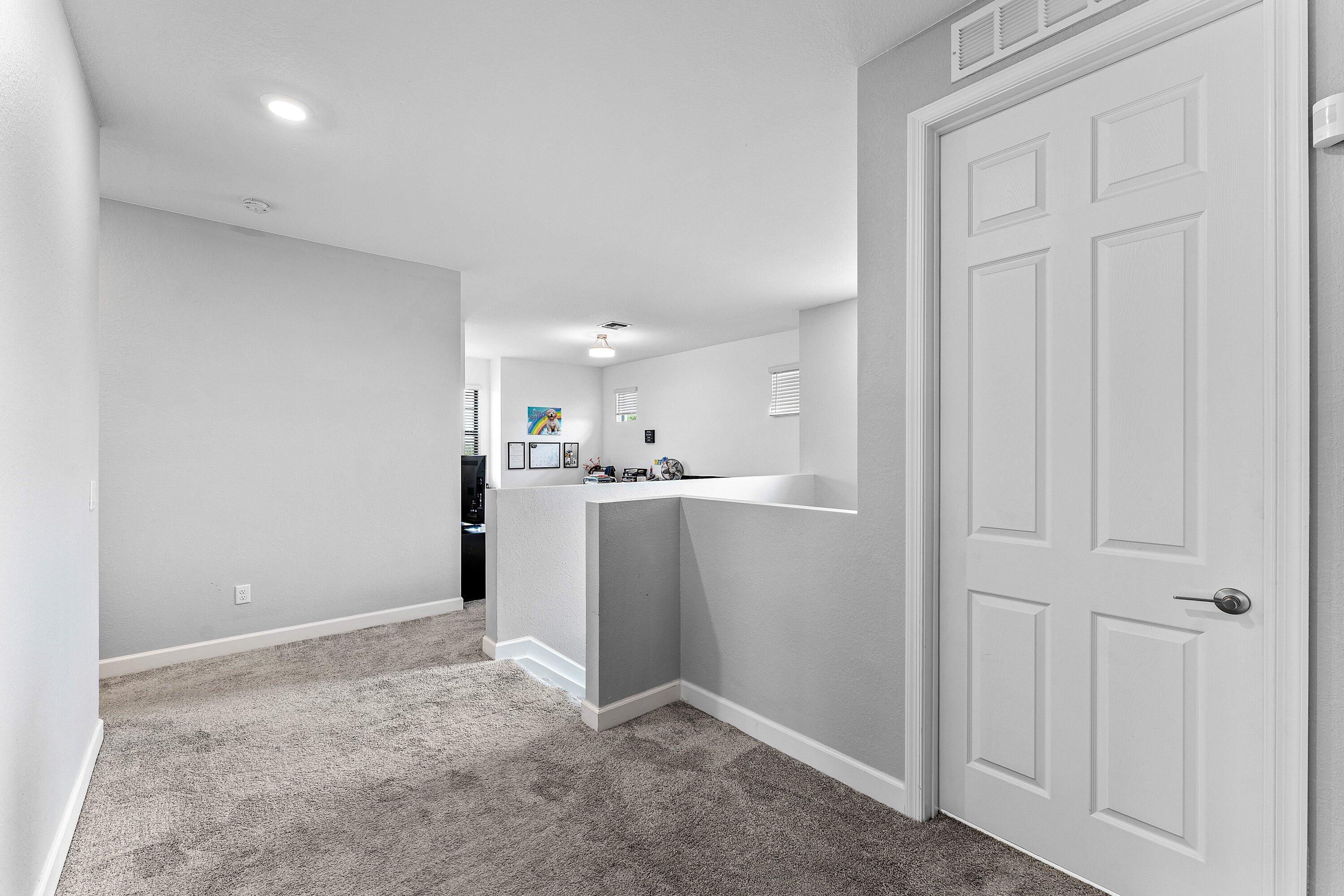 1063 Ember Ridge Run Loxahatchee, FL 33470 - Photo 23 of 76 UPSTAIRS HALLWAY