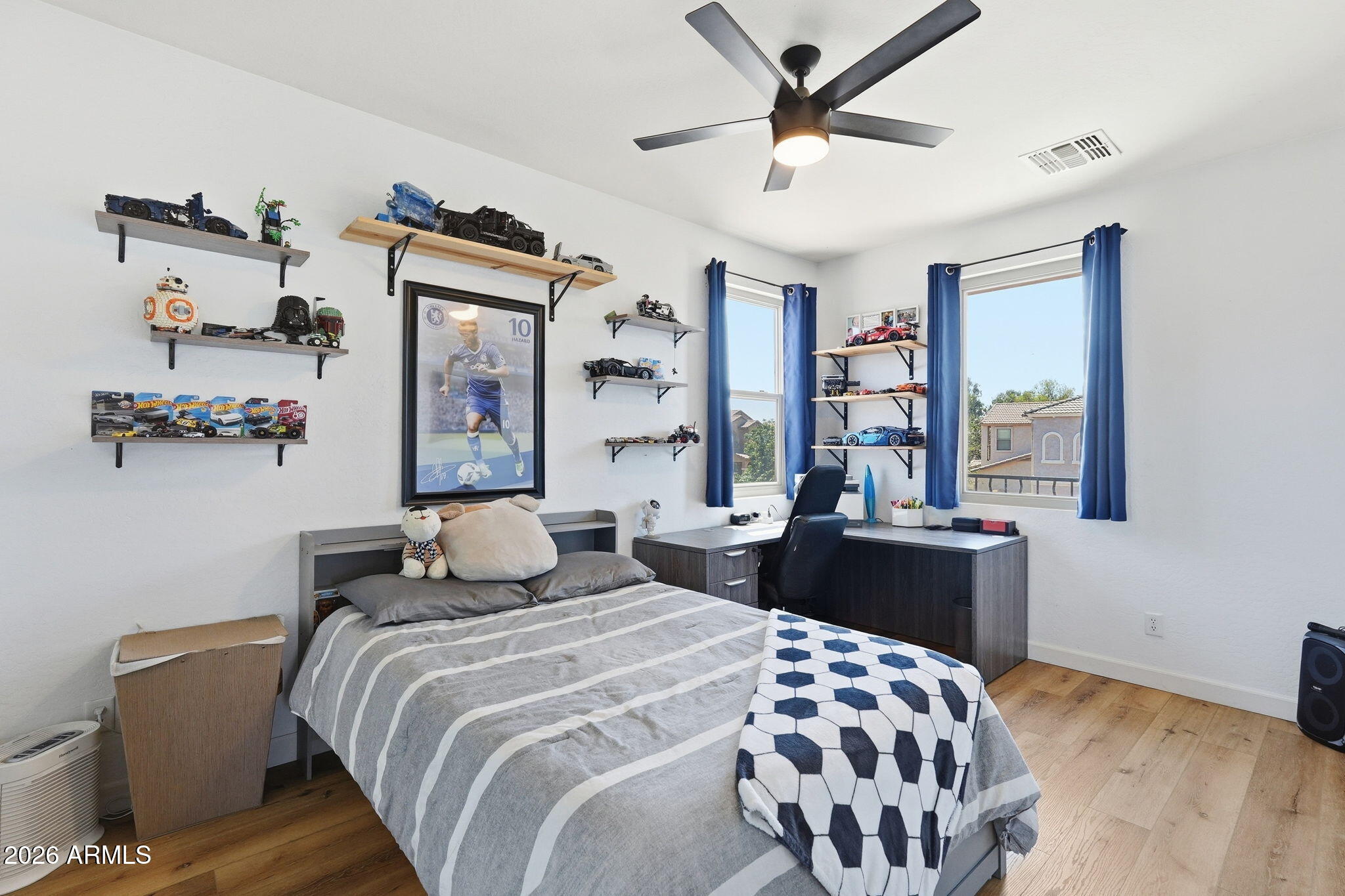 4184 East Trigger Way Gilbert, AZ 85297 - Photo 27 of 51 a bedroom with a bed and window