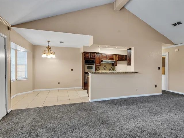 a view of kitchen and front door