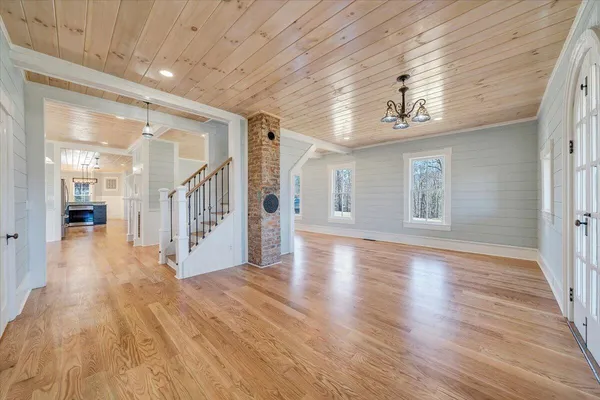 a view of a room that has a small window