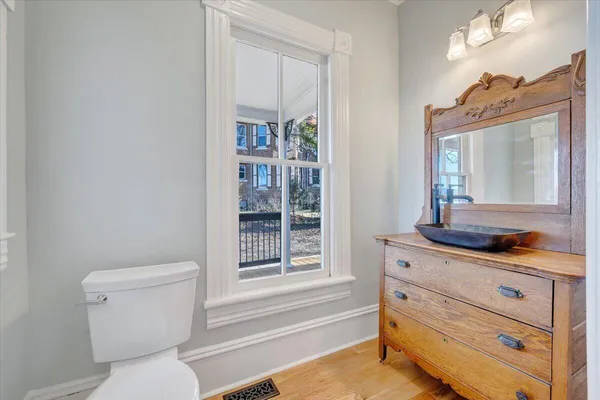 a bathroom with a sink toilet and bathtub