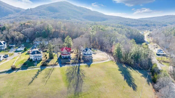 a view of a livingroom with wooden floor