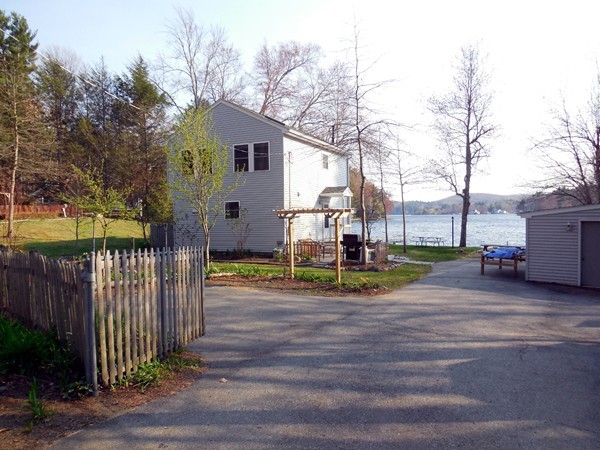 16 Leno Road Holland, MA 01521 - Photo 27 of 30 a view of a house with a small yard and large trees