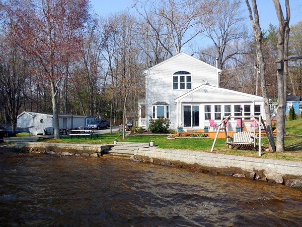 16 Leno Road Holland, MA 01521 - Photo 5 of 30 a front view of residential houses with yard and green space