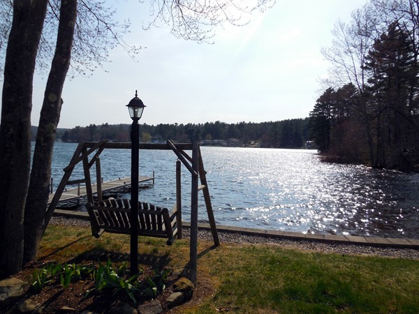 16 Leno Road Holland, MA 01521 - Photo 6 of 30 a view of a lake with a bench and trees in the background