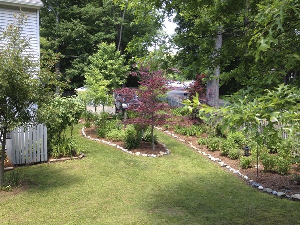 16 Leno Road Holland, MA 01521 - Photo 8 of 30 a backyard of a house with lots of green space