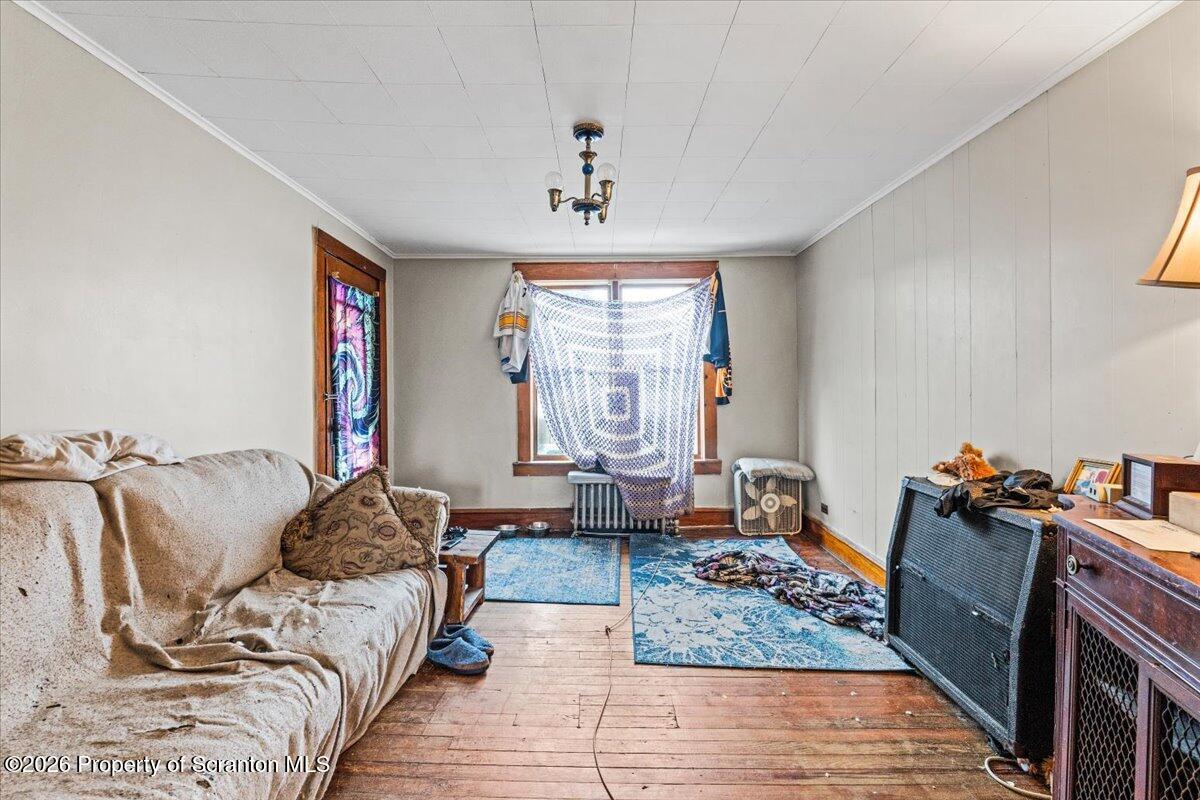 622 East Market Street Scranton, PA 18509 - Photo 11 of 44 a living room with furniture and a window