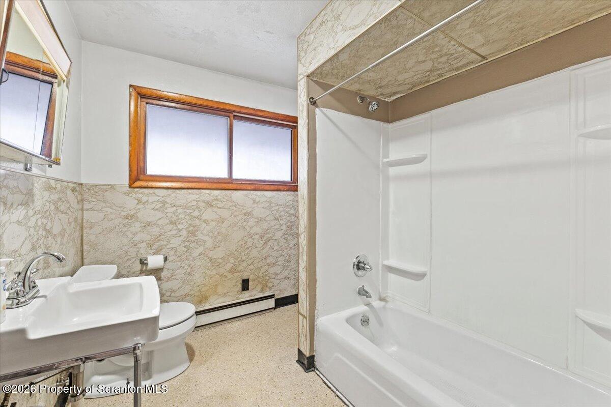 622 East Market Street Scranton, PA 18509 - Photo 20 of 44 a bathroom with a bathtub and shower