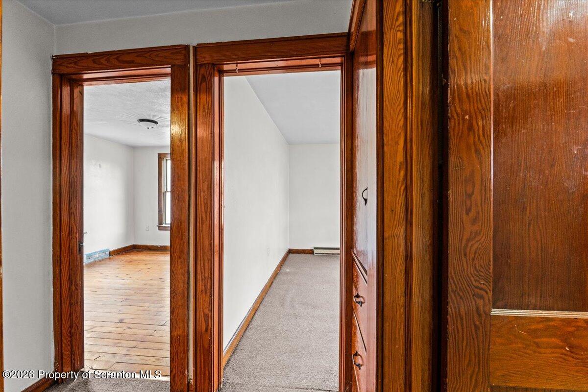 622 East Market Street Scranton, PA 18509 - Photo 27 of 44 a view of a bathroom from a hallway