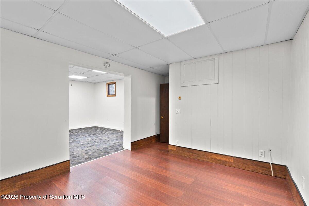 622 East Market Street Scranton, PA 18509 - Photo 37 of 44 a view of an empty room with wooden floor