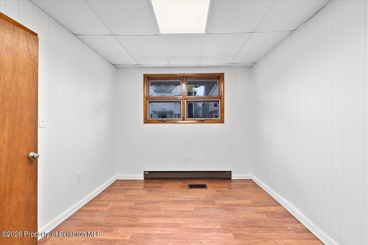 622 East Market Street Scranton, PA 18509 - Photo 42 of 44 a view of a room with wooden floor and small window