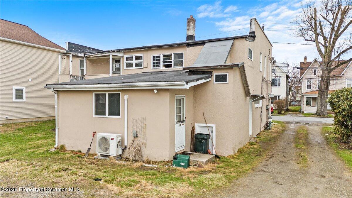 622 East Market Street Scranton, PA 18509 - Photo 5 of 44 a front view of a house with a yard