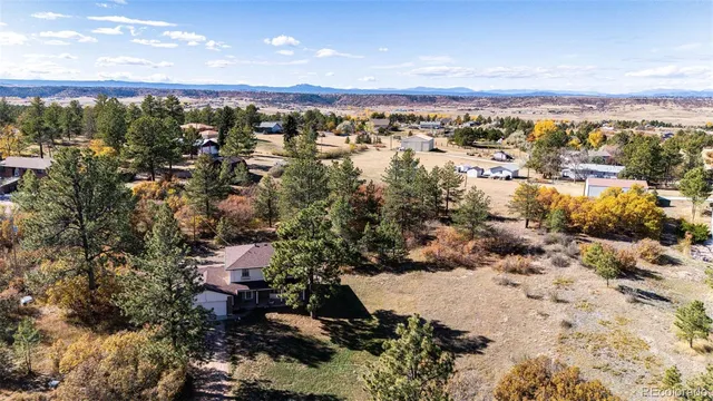a view of a city with a lake