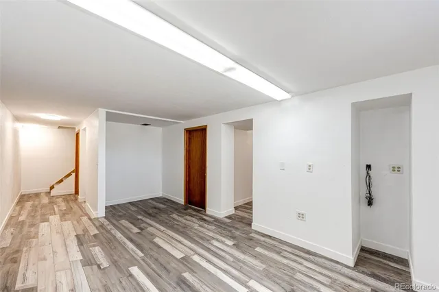 a view of small space with wooden floor