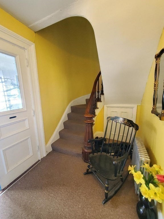 163 New Boston Road, Unit 2 Fall River, MA 02720 - Photo 11 of 15 a view of staircase and door