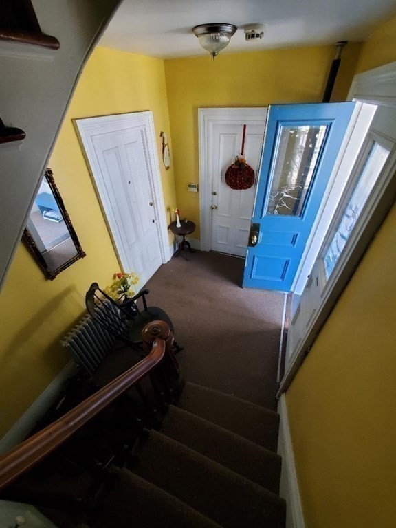 163 New Boston Road, Unit 2 Fall River, MA 02720 - Photo 15 of 15 a bedroom with window and gate