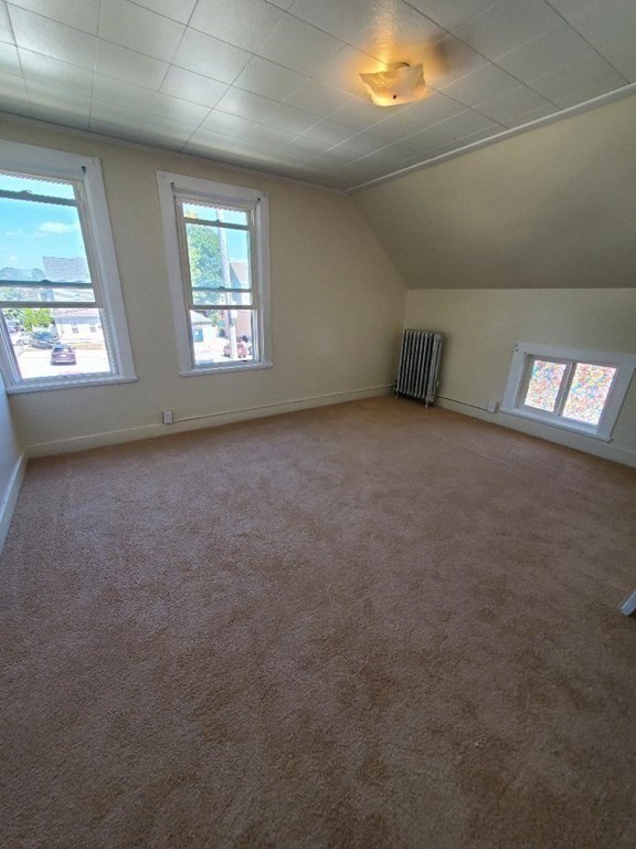 163 New Boston Road, Unit 2 Fall River, MA 02720 - Photo 4 of 15 a view of an empty room with windows