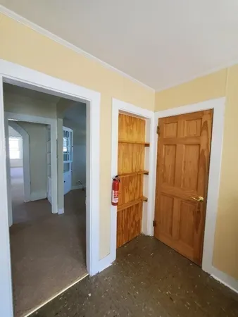 a kitchen with stainless steel appliances a stove and a microwave