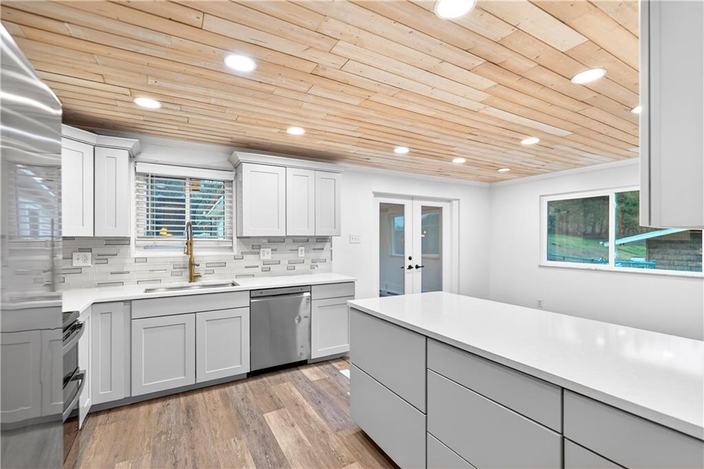 3 Park Road Charleroi, PA 15022 - Photo 13 of 43 a large kitchen with kitchen island a sink stainless steel appliances and cabinets