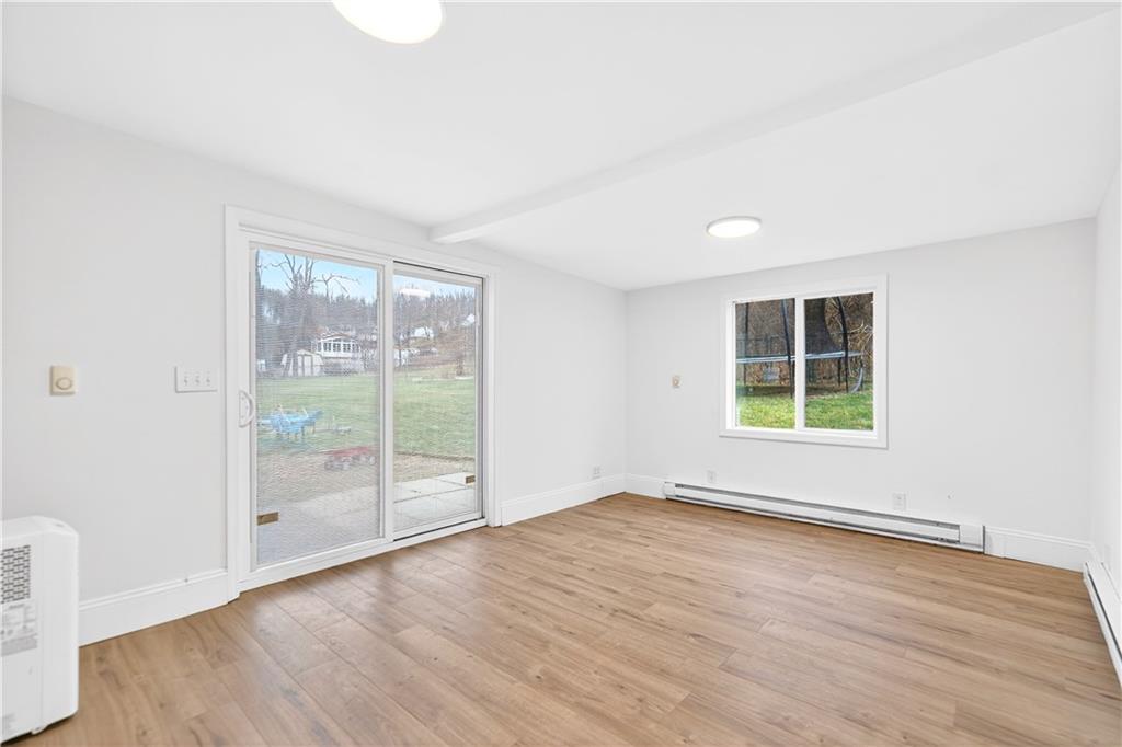 3 Park Road Charleroi, PA 15022 - Photo 15 of 43 an empty room with wooden floor and windows