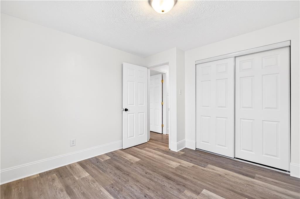 3 Park Road Charleroi, PA 15022 - Photo 24 of 43 a view of an empty room and wooden floor