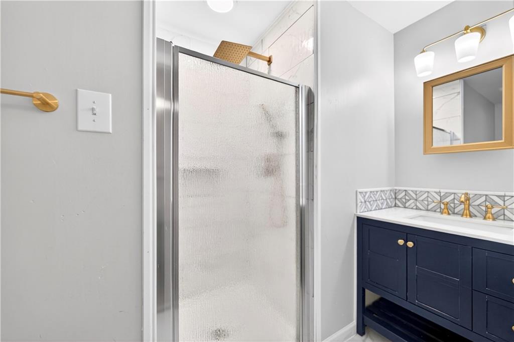 3 Park Road Charleroi, PA 15022 - Photo 26 of 43 a bathroom with a shower sink and mirror